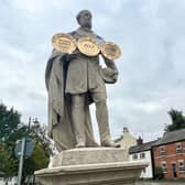 Having recently and respectfully worn a black armband for the Queen, Dunchurch's famous statue of Lord John Douglas Montagu Douglas Scott is now proclaiming the success of the village's Friends society in this year's Bloom awards.