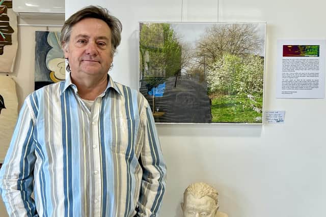 Curator Charlie Caldecott at The Blind Leading the Seers exhibition at the Stoneleigh Arms. Photo supplied