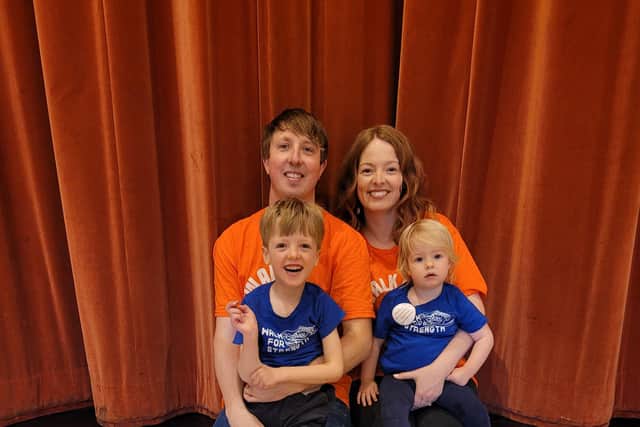 Kelly, husband Mike and their children at the fundraiser.
