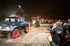 A Christmas convoy of more than 60 tractors and farm vehicles blazed a bright trail through south Warwickshire in aid of two local charities. Photo by Laurence Jones
