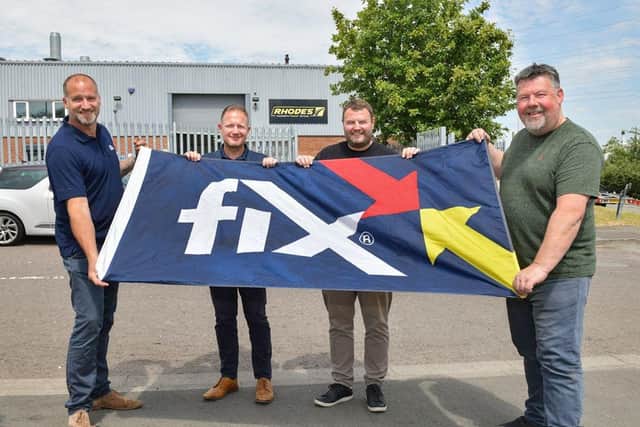 All good things come to those that wait… Fix Auto UK is finally able to fly its flag over a PJ Rhodes site after owner Terry Monaghan (right) has finally joined the network by bringing on board his Rugby-based repair centre. His is pictured with (from left) Steve Lawrence, Regional Business Manager Fix Auto UK, Martin Willis, Head of Business Development and Paul Yeomans, General Manager of PJ Rhodes who oversees the centre.