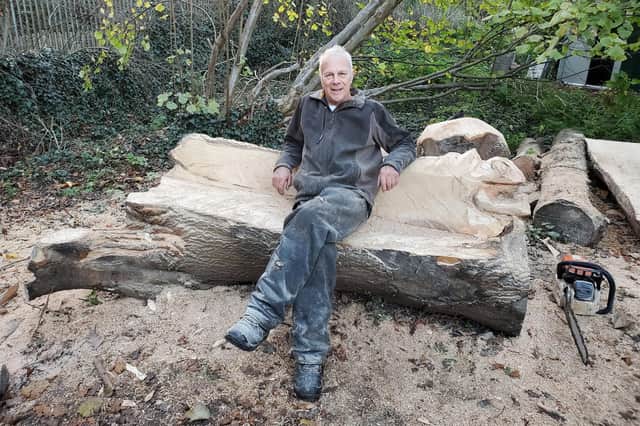 Last Saturday (November 19) Graham Jones was seen making more sculptures in Packmore’s Community Garden. Photo by Geoff Ousbey
