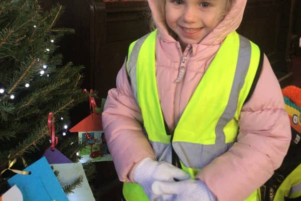 Little smiling angel from Riverside Academy.