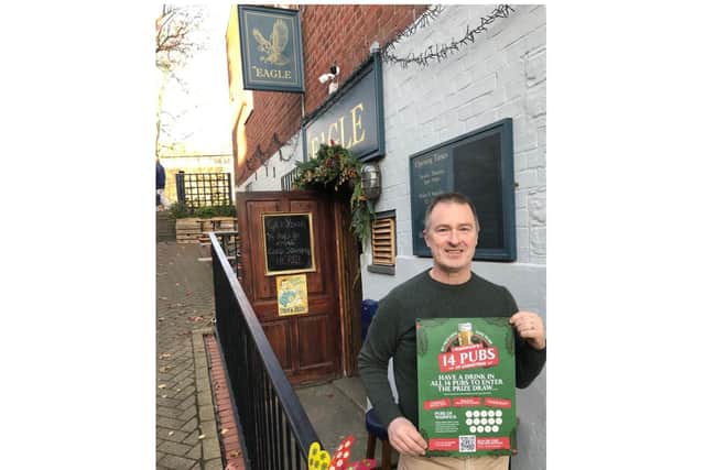 The trail has been organised by Chris Proudfoot, landlord at the Old Fourpenny Shop Pub & Hotel, and Tim Maccabee, landlord at The Eagle. Photo shows Tim Maccabee with one of the event posters. Photo supplied