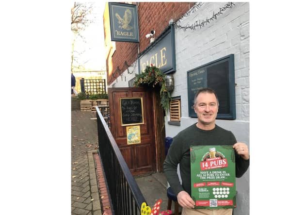 The trail has been organised by Chris Proudfoot, landlord at the Old Fourpenny Shop Pub & Hotel, and Tim Maccabee, landlord at The Eagle. Photo shows Tim Maccabee with one of the event posters. Photo supplied