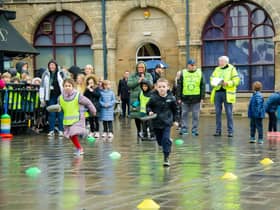 Warwick town centre hosted the annual 'Pancake Race' this week. Children from seven primary schools took part in 26 teams. Photo by Mike Baker