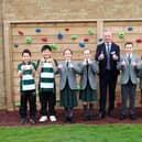 Headmaster, Joe Thackway, with pupils from Crescent School pictured by the school’s outdoor climbing wall.