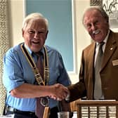 Brian Bassett (on the right) hands over the presidency to Barry Andrews