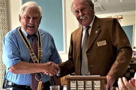 Brian Bassett (on the right) hands over the presidency to Barry Andrews