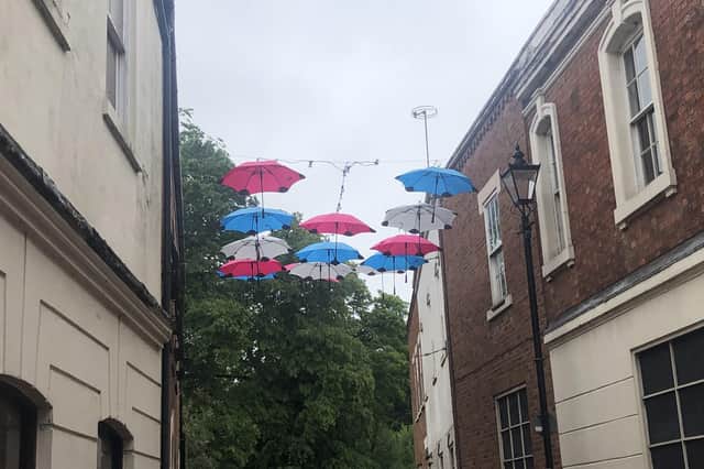 With the exception of some bunting, which business owners said had been used for previous events too, the umbrellas were the only apparent jubilee decorations.