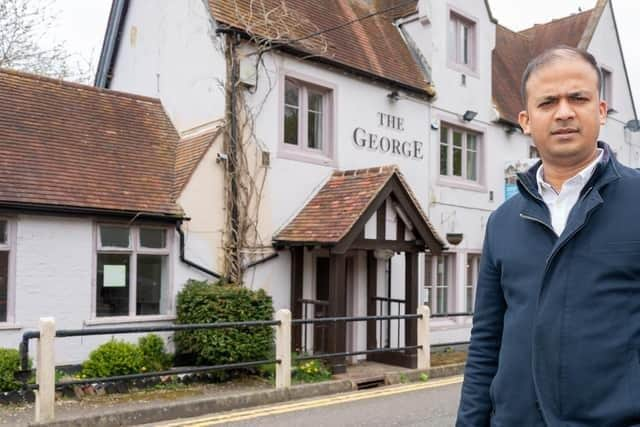 Hari outside The George at Kilsby.