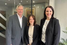 Lois Harrison (centre) with David Lester, senior partner, and Claire Kirwan, partner and head of personal injury and medical negligence, at Blythe Liggins Solicitors in Leamington Spa