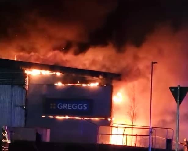 Fire fighters tackle the blaze at Greggs in Exhall. Picture: Camiltan Thavarasa