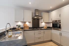 B&DWM - The kitchen of the Greenwood show home at Heritage Grange