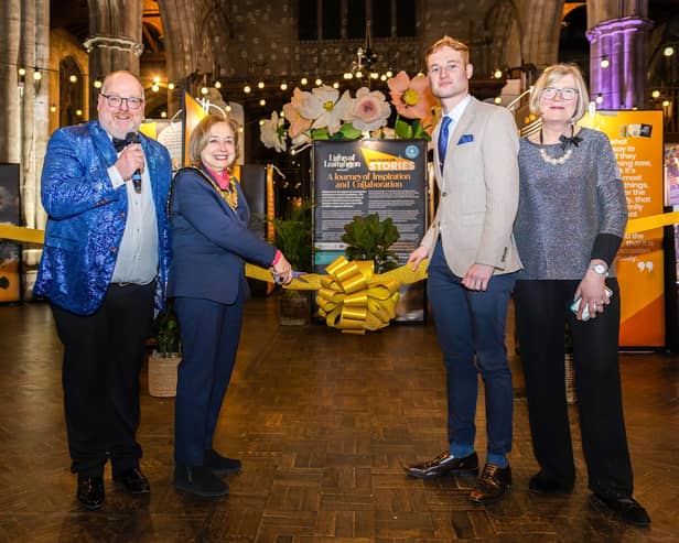 The ribbon cutting for the launch of the exhibition.