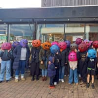Kenilworth community gets in the Halloween spirit early with parade of pumpkin heads