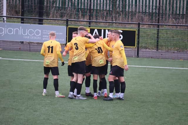 Warwick celebrate Archie Hamps' goal.