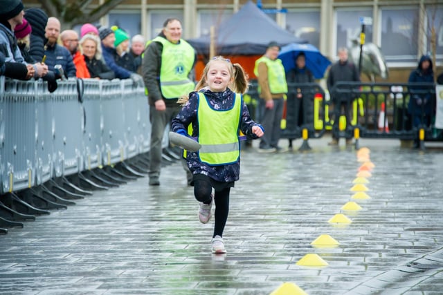 Warwick town centre hosted the annual 'Pancake Race' this week. Children from seven primary schools took part in 26 teams. Photo by Mike Baker