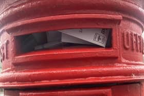 The red post box in Willes Road was overflowing.
