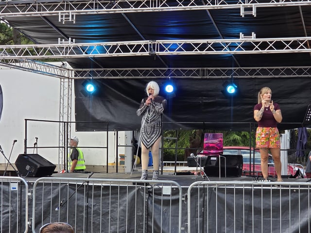 The festival features a line-up of performances on the stage.