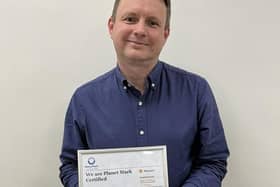 Mark Shrimpton, of Wright Hassall, with the Planet Mark certificate