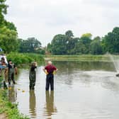 The community in Kenilworth rallied 24/7 to help save hundreds of fish at Abbey Fields Lake. Photo by Mike Baker