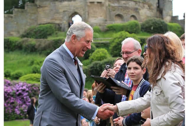 King Charles, then the Prince of Wales, visits Warwick Castle in 2014. Credit: F Stop Press / Warwick Castle.
