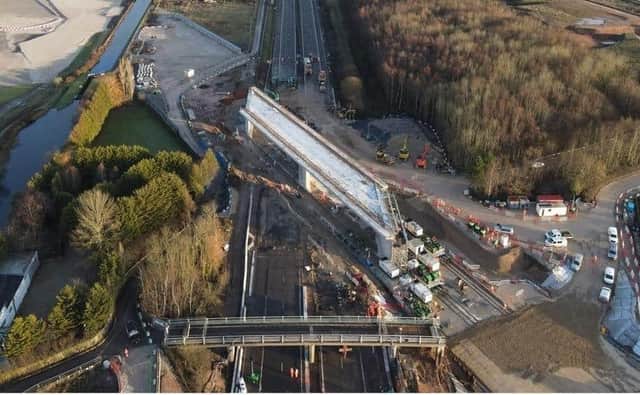 A 12,600 tonne bridge was slid into place over the M42 in Warwickshire, in what engineers described as a 'world first'. Photo supplied