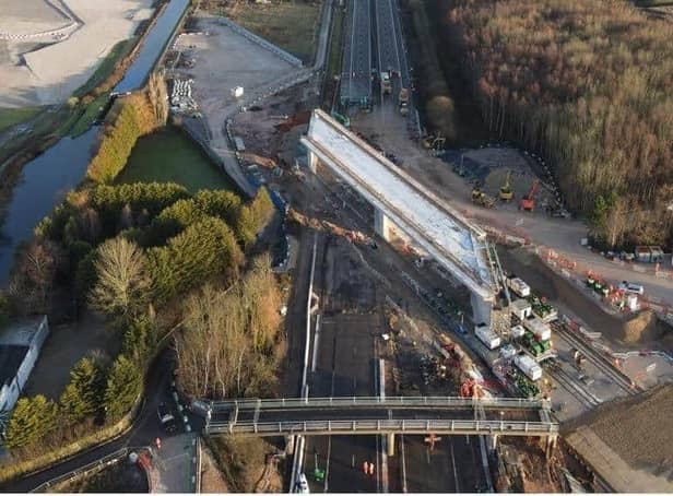 A 12,600 tonne bridge was slid into place over the M42 in Warwickshire, in what engineers described as a 'world first'. Photo supplied