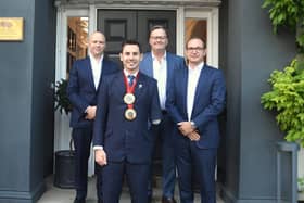 James Ellerington, left, Robert Wigley, centre, and James Davies, with Paralympian Jaco Van Gass
