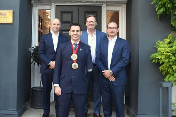 James Ellerington, left, Robert Wigley, centre, and James Davies, with Paralympian Jaco Van Gass