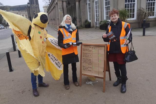 Campaigners representing the climate campaign group Just Stop Oil outside the Royal Pump Rooms