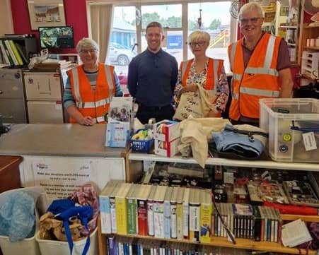 In the image, from left to right: Sylvia (volunteer), Reece McLarnon (Director of Services), Jayne (volunteer), Ron (volunteer)
