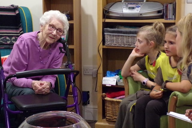 The Brownies heard about the residents' time in the British Armed Forces and their memories of Brownies and Guides. Photo supplied