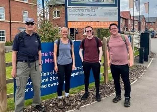 Rob Perkins, Alice Fish, Christy Mclean, and Dan Forrester from Bellway South Midlands’ land and planning team after completing their nine-mile charity walk from Staverton Lodge in Daventry to Houlton Meadows in Rugby