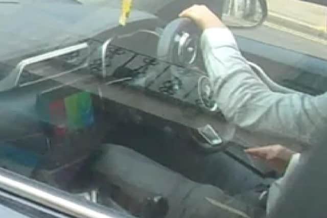 This driver has been banned from driving for six months after a member of the public filmed him using his phone at the wheel in Leamington.