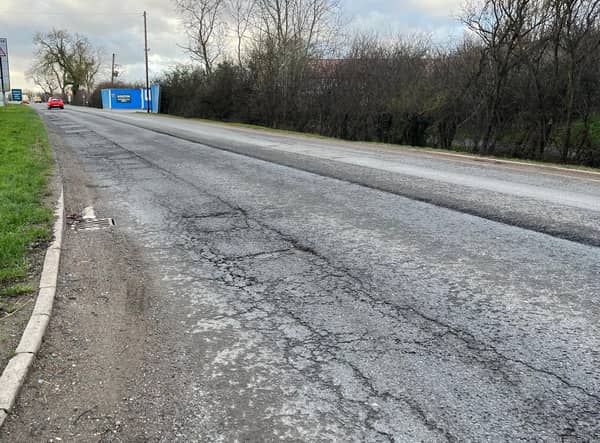 A broken surface on the side of the road and a deep ridge in the middle, this is the view from the Nortoft Lane junction back towards Houlton, just a small part of the problems on that stretch of the A428.