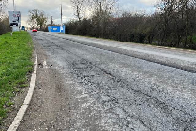 A broken surface on the side of the road and a deep ridge in the middle, this is the view from the Nortoft Lane junction back towards Houlton, just a small part of the problems on that stretch of the A428.