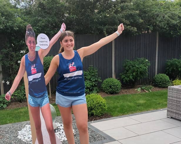 Evie Headland with her cardboard cut-out.