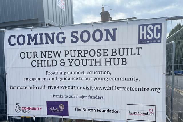 Spreading the word... the banner at the Hill Street site highlights that the remarkable new addition is coming soon.