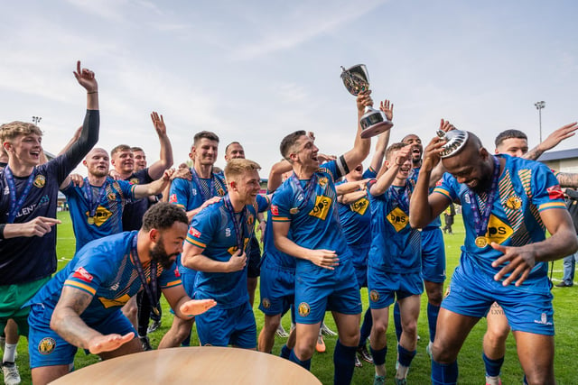 Leamington FC players celebrate the playoff final victory.