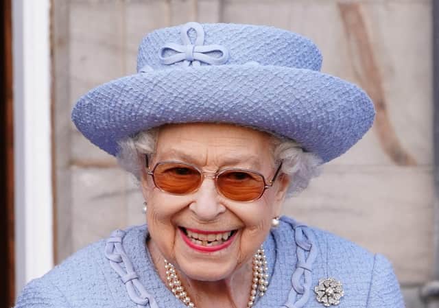 Britain's Queen Elizabeth II smiles as she attends the Queen's Body Guard for Scotland in June.