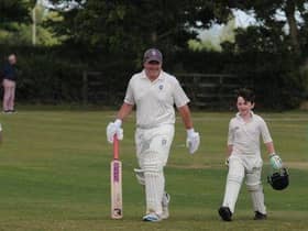 Adam Shay and Will Shay, aged 8.