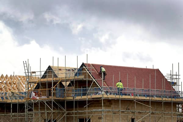Hospital chiefs are making a legal move against Harborough District Council after failing to get almost £1 million to treat more patients from a massive new estate near Lutterworth.