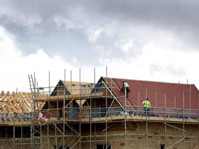 Hospital chiefs are making a legal move against Harborough District Council after failing to get almost £1 million to treat more patients from a massive new estate near Lutterworth.