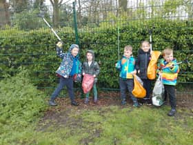Pictured left to right are Long Itchington litter pickers Oliver, Henry, Joseph, Scarlett and Felix. Picture supplied.