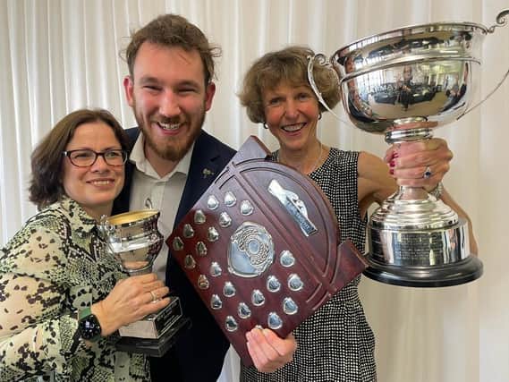 Leamington Speakers Club's prize winners, Sarah Wadsworth, Micheal Cox and Jill Finney with their trophies.