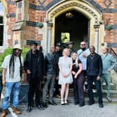 UB40 stars with staff at Brownsover Hall Hotel.
