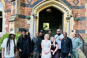 UB40 stars with staff at Brownsover Hall Hotel.