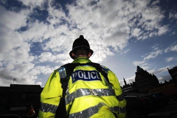 Police officers were reportedly bitten while trying to detain a man who was causing a disturbance in a Leamington street.